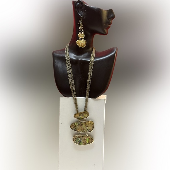 Multi colored swirl stone in goldtone setting. - Picture 2 of 2